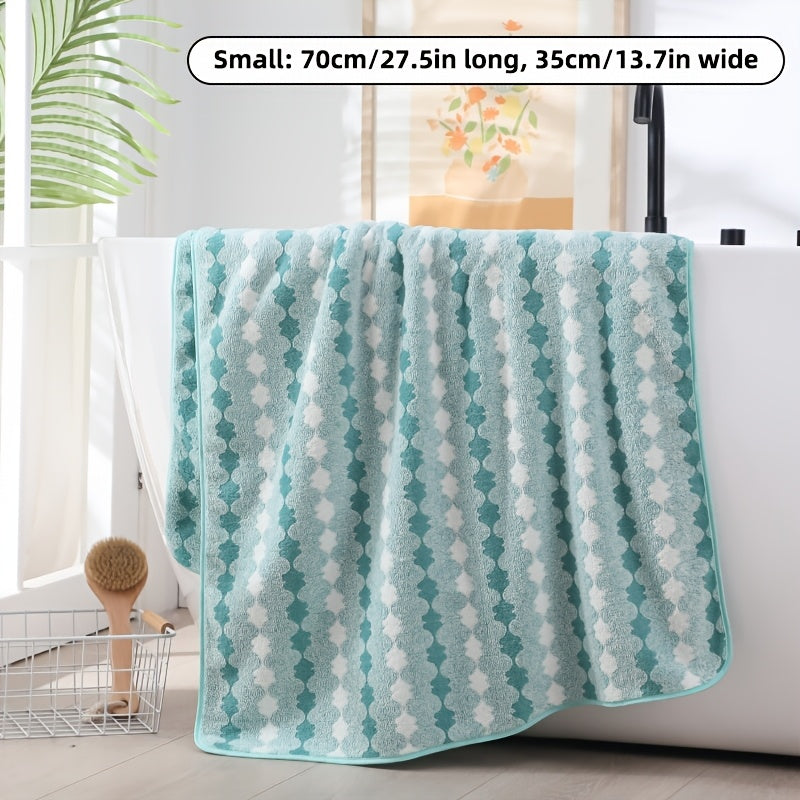 One set of extra large and small bath towels for women made of super soft, absorbent coral velvet with a modern design and strong absorbency.