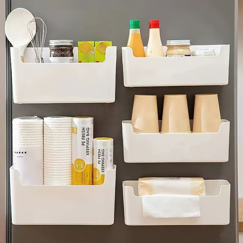 Get your hands on the 1-piece Kitchen Storage Box that can neatly store disposable paper cups, plastic wrap, seasonings, and more. This box comes equipped with 3 sheets of sturdy double-sided film and can be mounted on the wall without the need for