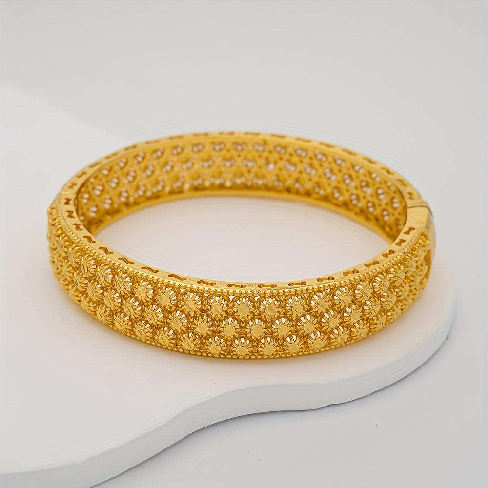 Golden Open Bracelet with Elegant Hollow Design - Perfect for Middle East festivals and as a gift for women. This fashionable hand ornament combines Dubai and European/American ethnic styles, making it a luxurious choice for brides.