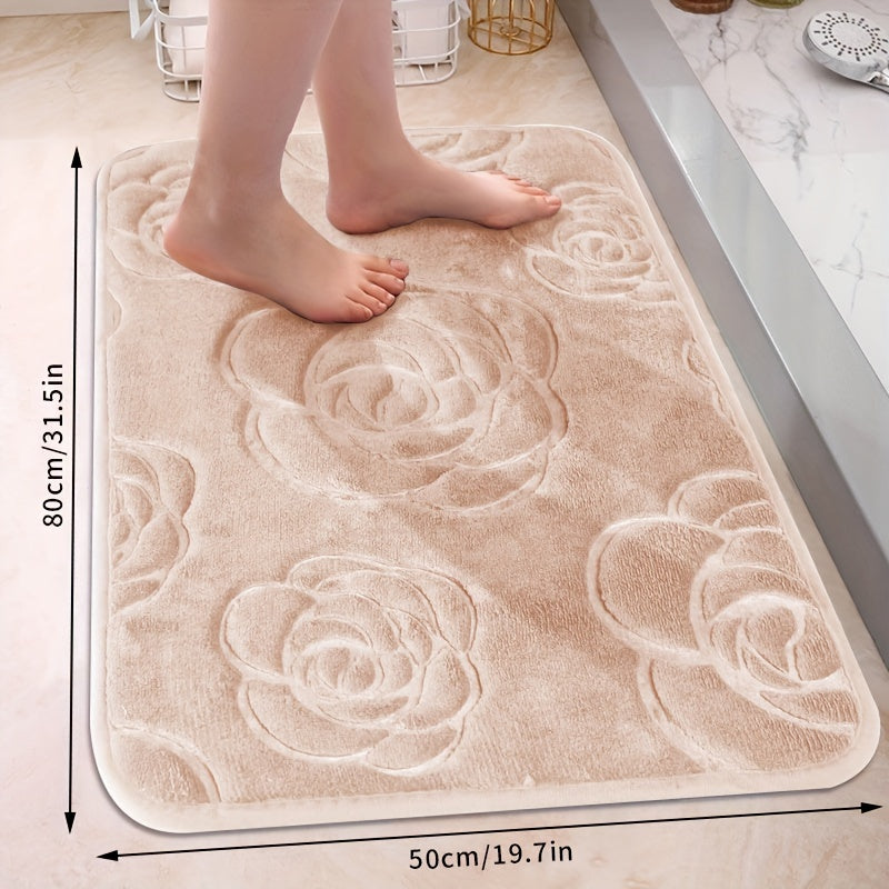 Soft and luxurious bath mat featuring a beautiful rose embossed design. This non-slip bathroom rug is made of ultra-soft knit polyester, providing superior comfort and absorbency. Lightweight and washable, this versatile mat is perfect for use in the