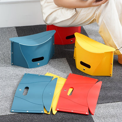 This versatile folding stool is made of sturdy plastic and doesn't require any assembly. It can easily be folded into a compact size with a convenient carrying handle, making it perfect for camping, fishing, or picnics. Available in red, yellow, and blue.