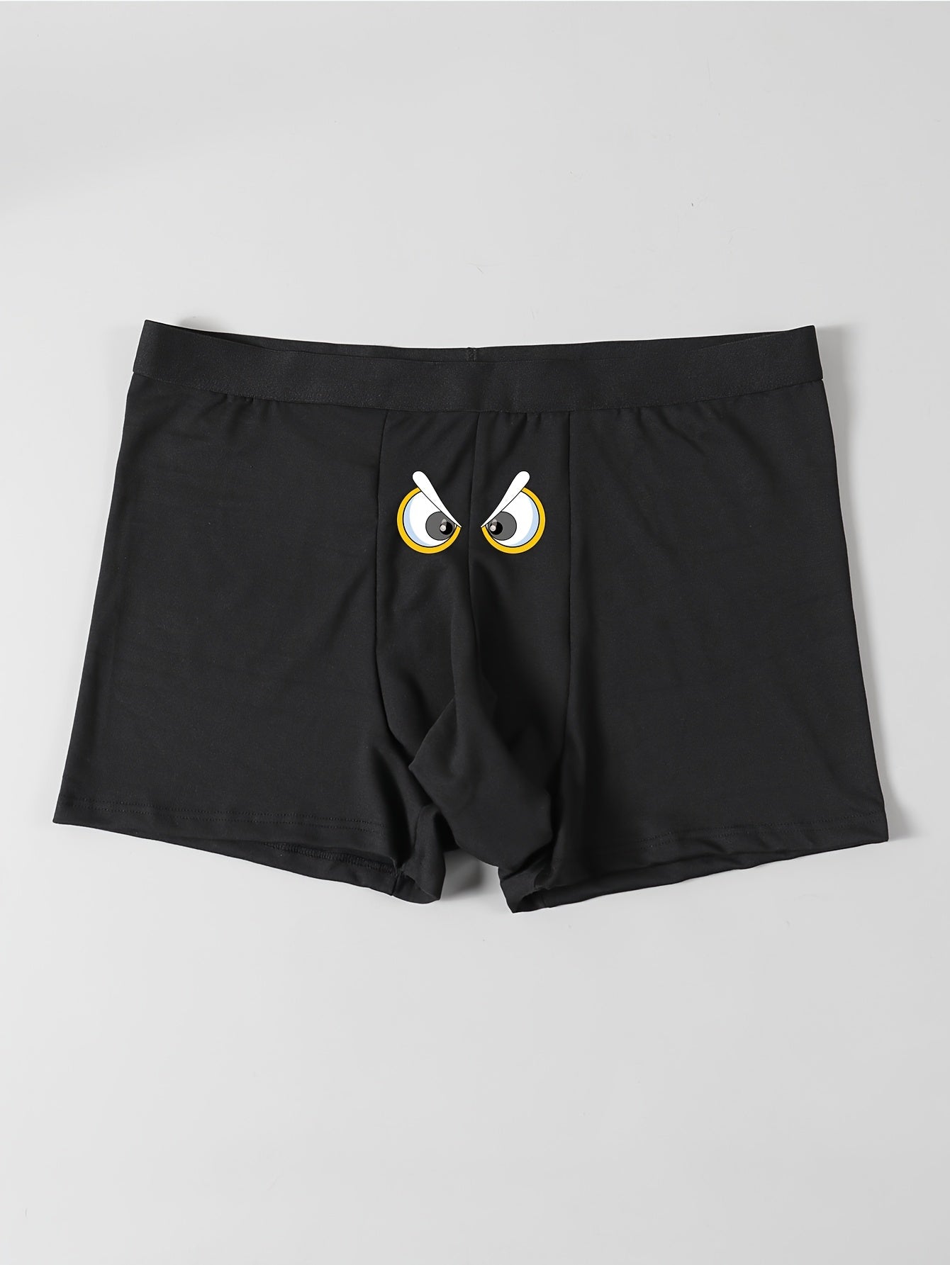 Men's playful cartoon eye print boxer briefs - stretchy, breathable, and comfortable knit fabric with elastic waistband in black.