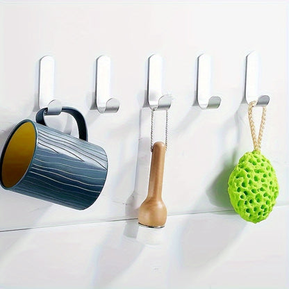 6 J-shaped hooks for hanging clothes on doors or walls without damaging them.