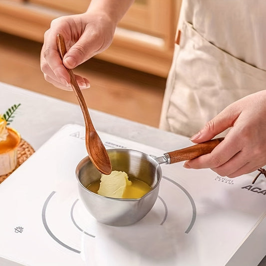 Set of stainless steel saucier pots with a 300ml capacity. Features include a multi-functional oil splash guard, insulated handle, anti-scald design, mini saucepan, and cooking spoon combo. Perfect kitchen essentials for sautéing and melting.