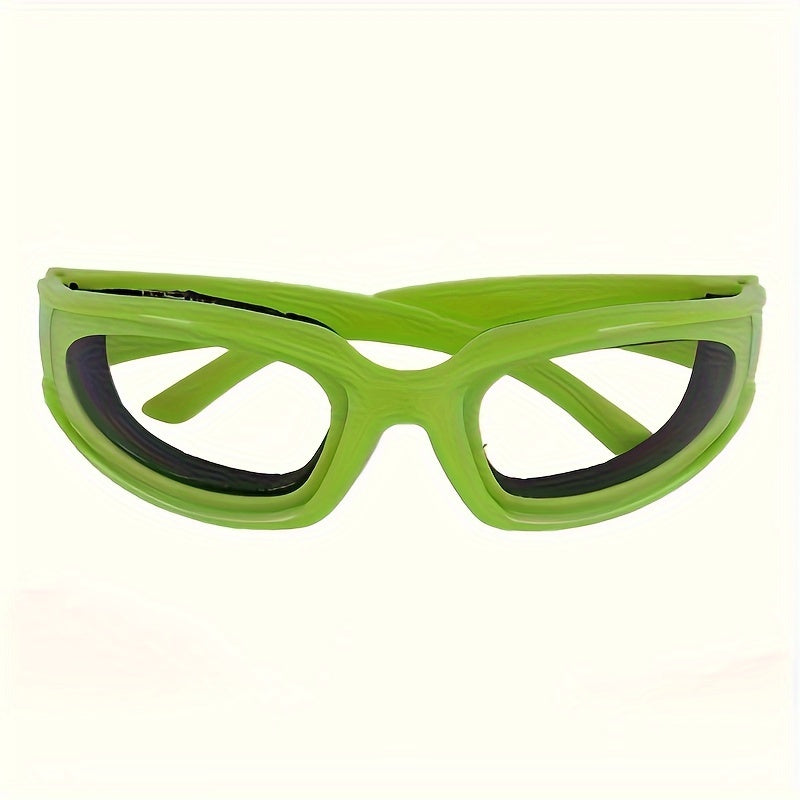 Kitchen Onion Cutting Goggles designed to protect eyes during chopping, made from anti-spicy material and splash-proof coating. Suitable for use in the kitchen to guard against eye irritation. Crafted from food-grade plastic for safety.