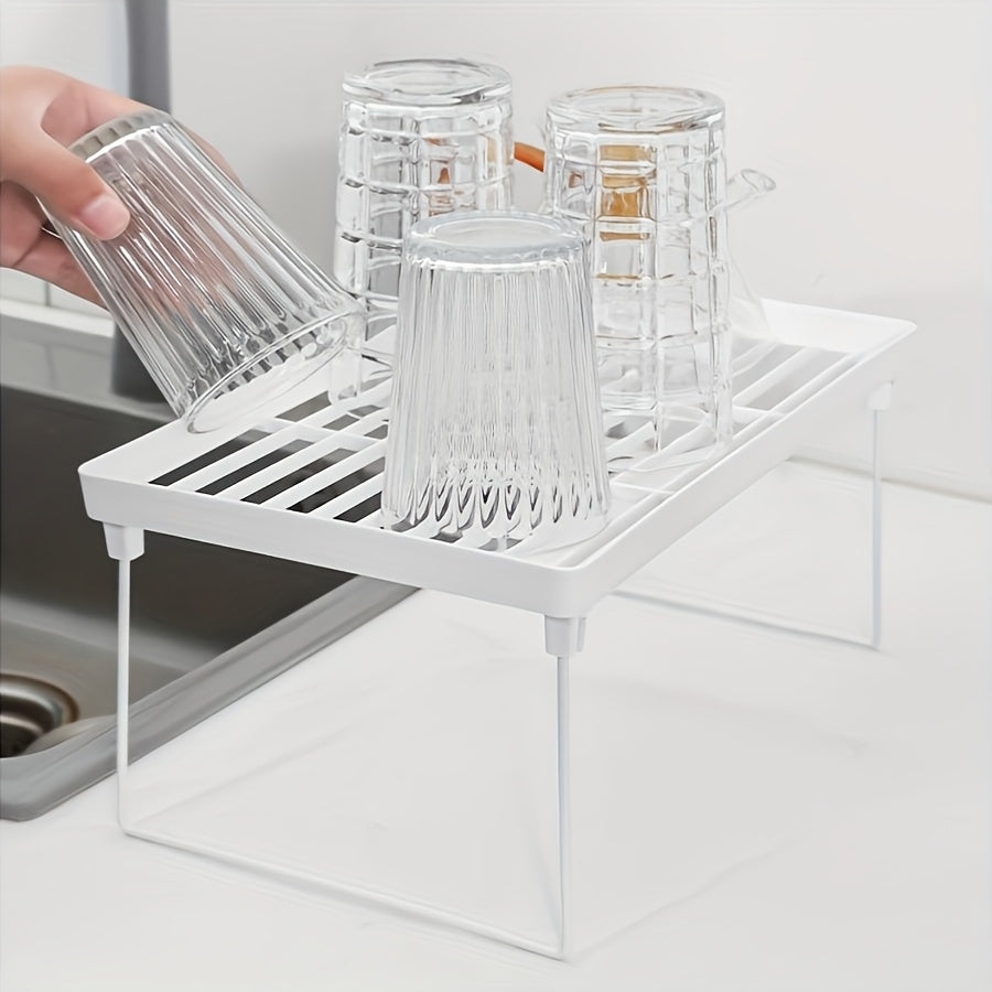 Modern Multi-Functional Desktop Organizer:
- Foldable open shelf stand
- Can be used for kitchen utensil storage
- Space-saving home organization solution
- Made of durable plastic
- No electricity needed