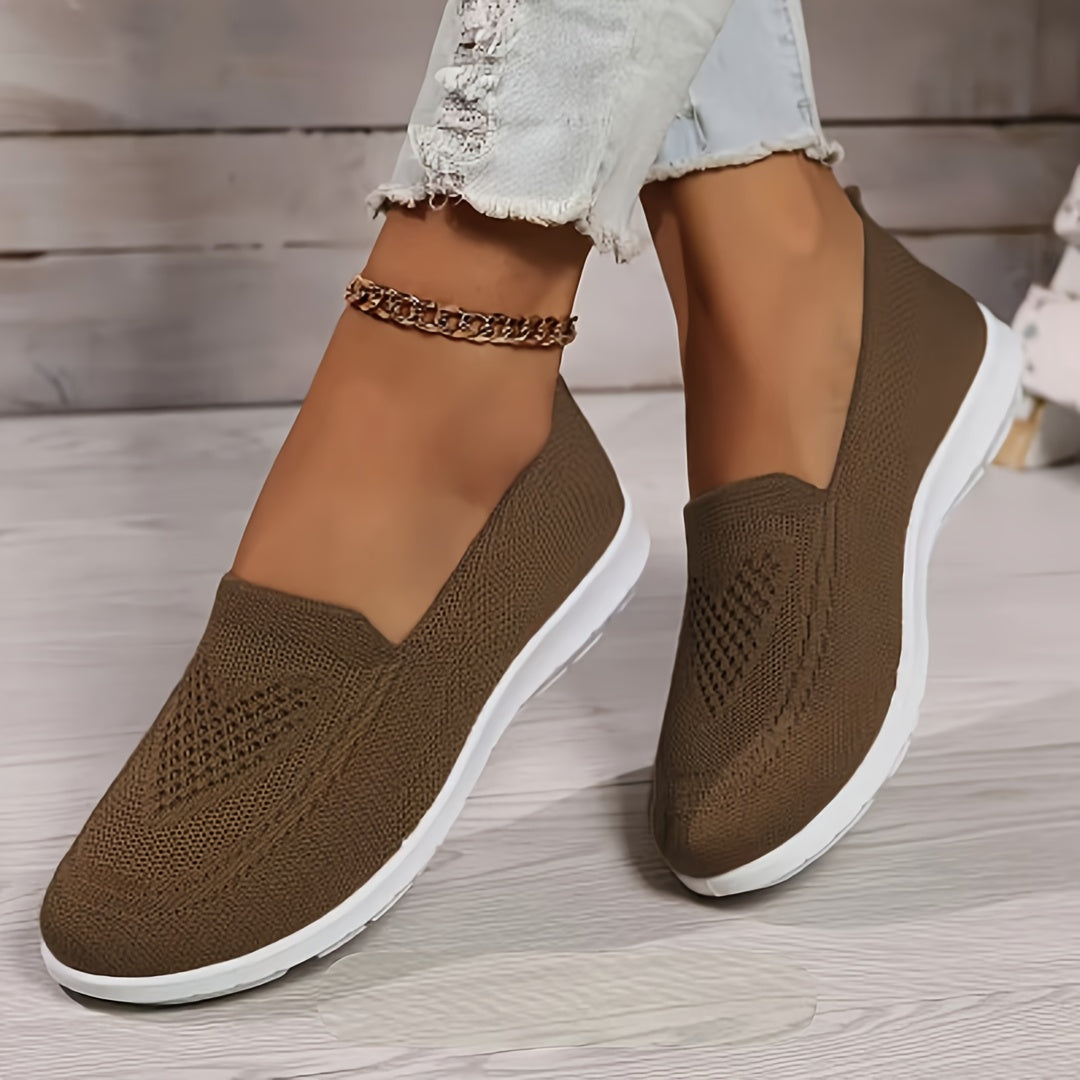 Women's slip-on sneakers are lightweight and breathable with PVC sole and fabric lining. Perfect for all seasons, available in multiple colors.