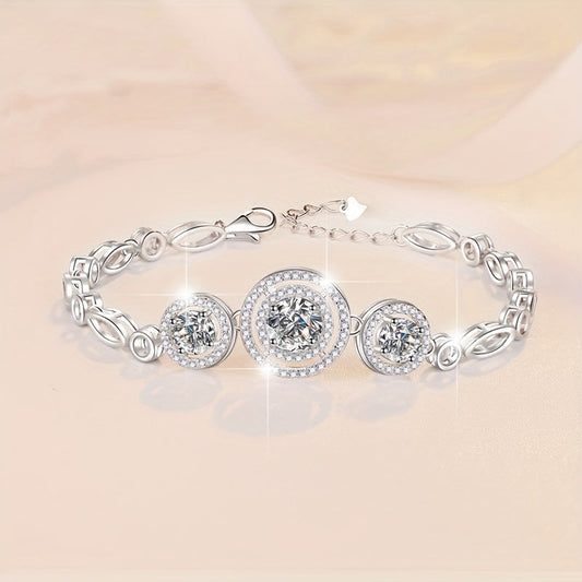 This new 925 Sterling Silver Moissanite Bracelet features a stunning 2 Carat Round Bag design, exuding a fresh and versatile temperament. It is the perfect piece of jewelry for women, making it an ideal anniversary gift. This bracelet is suitable for