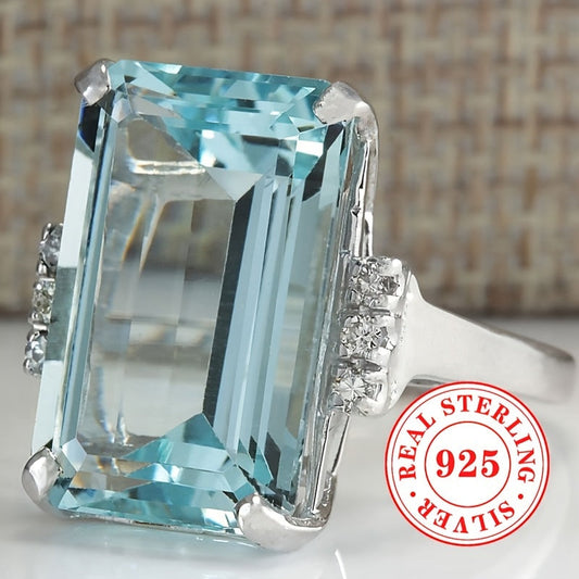 Stylish 925 Sterling Silver Ring featuring a Synthetic Aquamarine March Birthstone, Perfect for Vacations, Parties, and Banquets. Set in a 4-Prong Setting for All Seasons