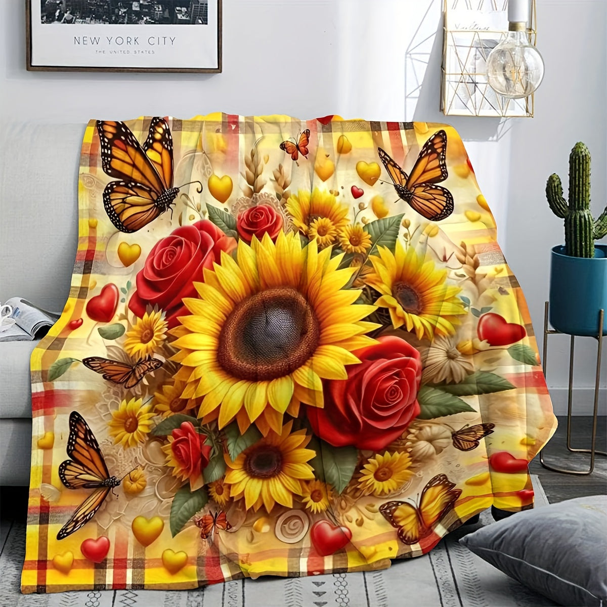 This versatile Sunflower and Butterfly Print Flannel Fleece Throw Blanket is the perfect addition to your home decor. With its reversible design, tear-resistant construction, and all-season functionality, this blanket combines contemporary style with