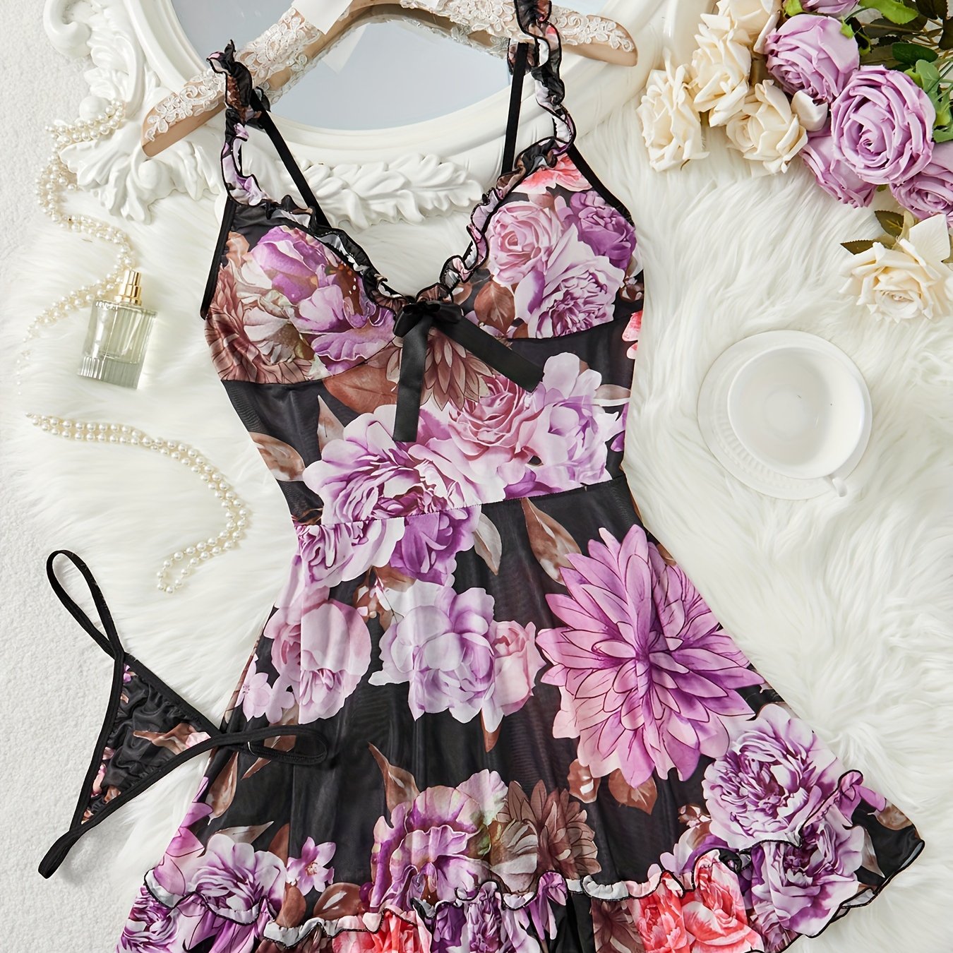 Floral print two-piece sleepwear set with ruffle hem and adjustable straps includes lingerie night dress and matching thong for women.