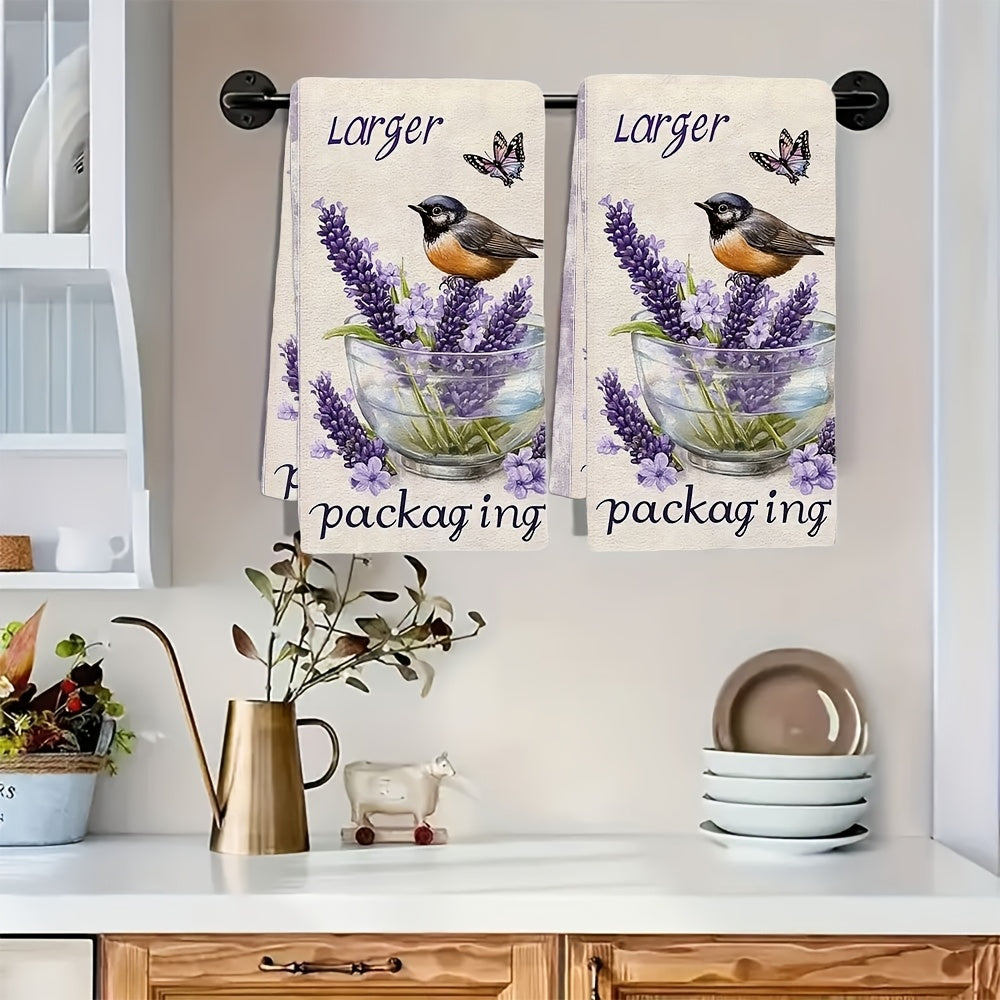 Pair of ultra-soft lavender kitchen towels adorned with birds and butterflies in purple hues. These highly absorbent towels are perfect for holiday decor and are machine washable. Each towel measures 40.64x60.96 cm.