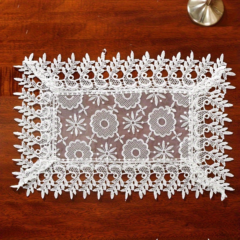 Polyester table runner with white embroidery flowers and lace edge, perfect for room or dining table decor.