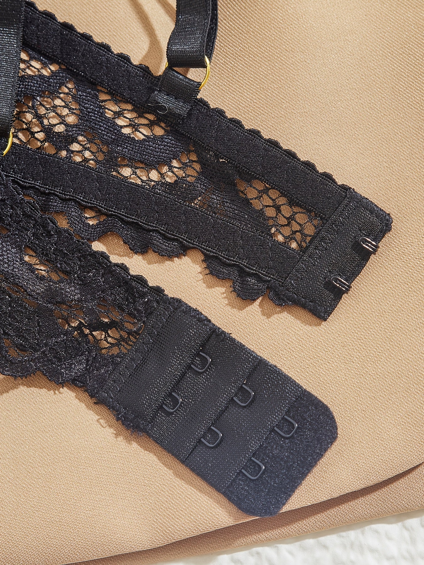 Seductive black lingerie set with underwire and lace T-pants for a small chest lift.