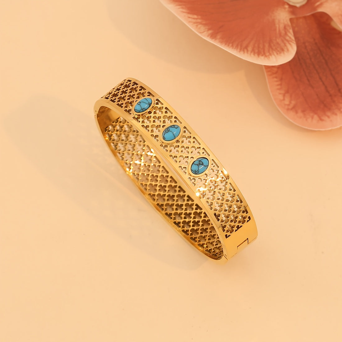 1pc of Vintage Style 18K Golden Plated Stainless Steel Bracelet featuring Turquoise Inlay and Hollow Pattern Design, specially designed for women as a Daily Wear Jewelry piece. This bracelet is the perfect Valentine's Day Gift.