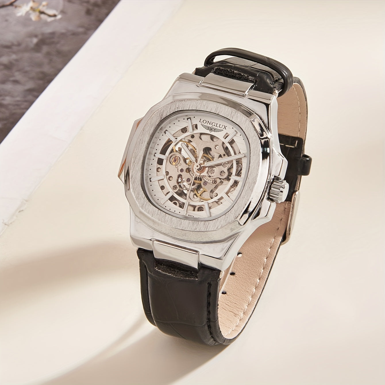 Model #8057P features a 4.1cm barrel-shaped faux leather strap, square dial, waterproof mechanical design suitable for both business and casual wear. It also includes a mineral glass face