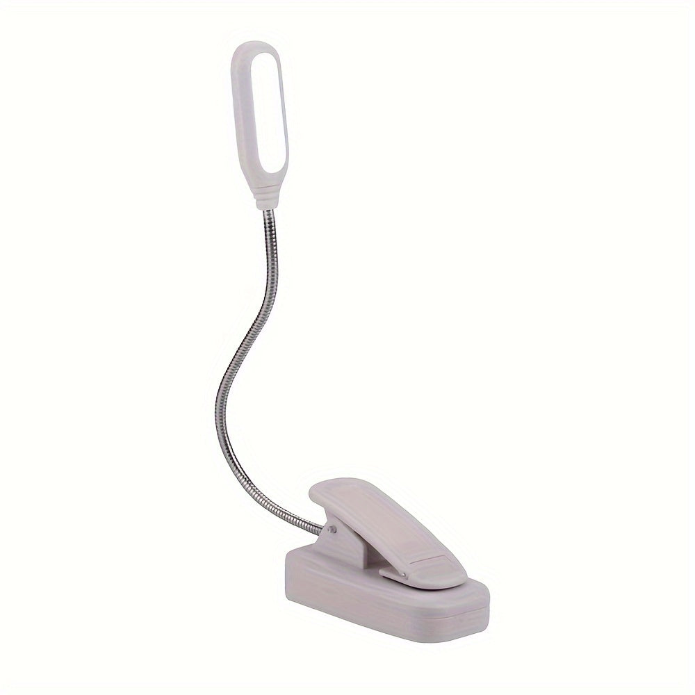 Portable LED book light with adjustable arm, push button control, and polished finish. Battery not included.