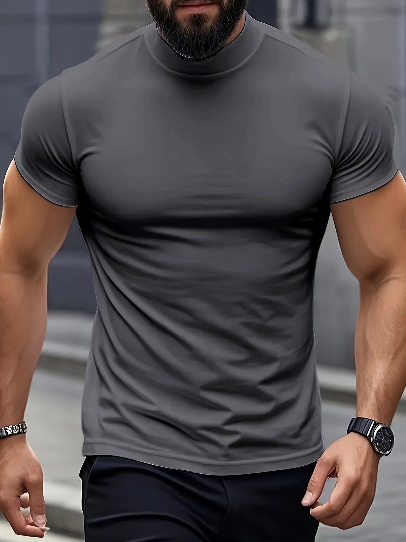 Men's slim fit short sleeve t-shirt with stand collar, ideal for gym and outdoor activities, made of breathable polyester-spandex blend, suitable for all-season wear.