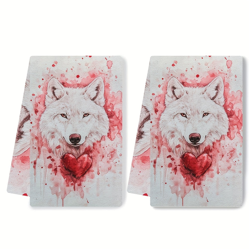 Set of 2 Ultra Soft Kitchen Towels featuring a Valentine's Day Wolfy design. These highly absorbent and machine washable dish hand towels measure 40.64x60.96 cm. The contemporary white towels are accented with red splashes and a heart detail, perfect for