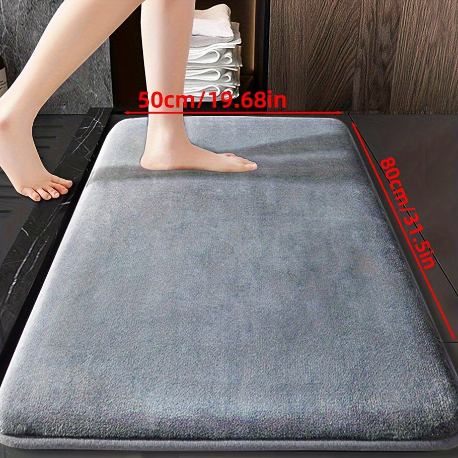 Soft and durable polyester bathroom mat with geometric design, ideal for shower, bathtub, bedroom, and living room. Versatile and non-slip, it is highly absorbent and machine washable.