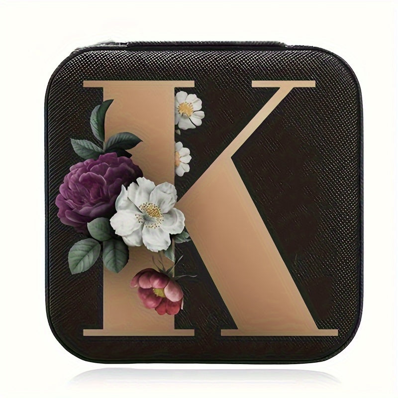 Floral initial jewelry organizer box with compact design, soft velvet lining, durable zipper, and lightweight, ideal for jewelry organization and travel.