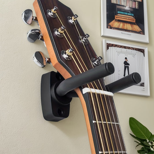 Stainless steel wall-mounted holder for guitars, ukuleles, and violins. Easy to install and adjustable. Black color with non-slip sponge.