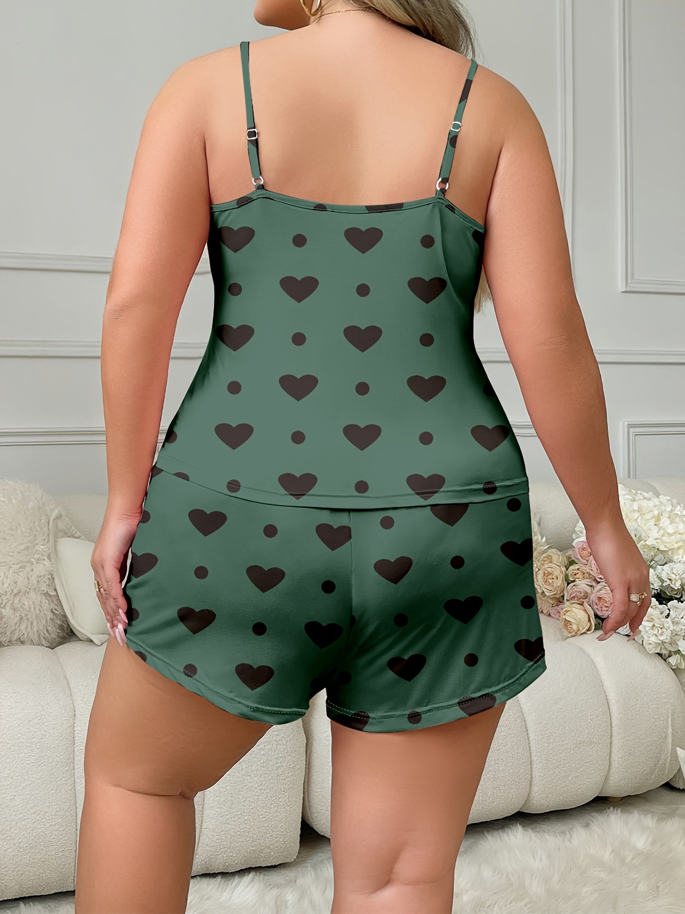 Plus size heart and polka dot print pajama set with round neck cami top and shorts.