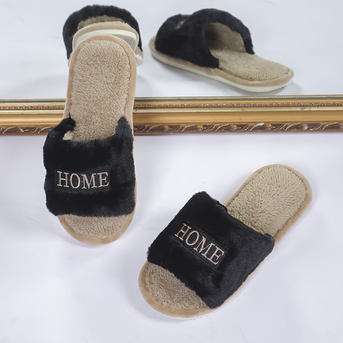 White plush slippers with "HOME" embroidery, cozy and comfortable for all seasons.