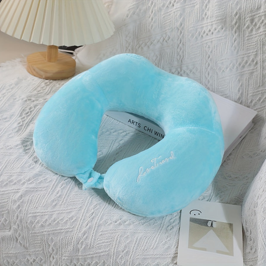 Soft and portable travel pillow in U shape, perfect for neck support on planes, trains, and cars. Ideal for a comfortable rest while traveling.