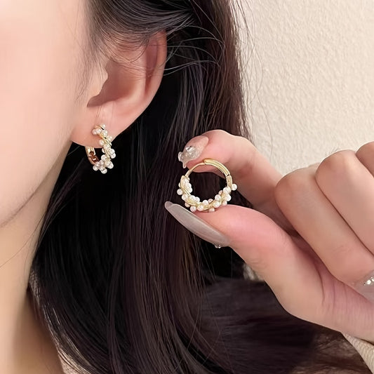 Stylish floral wreath hoop earrings with faux pearls, elegant and versatile, made of golden-toned zinc alloy with stainless steel posts, perfect for daily wear or vacation