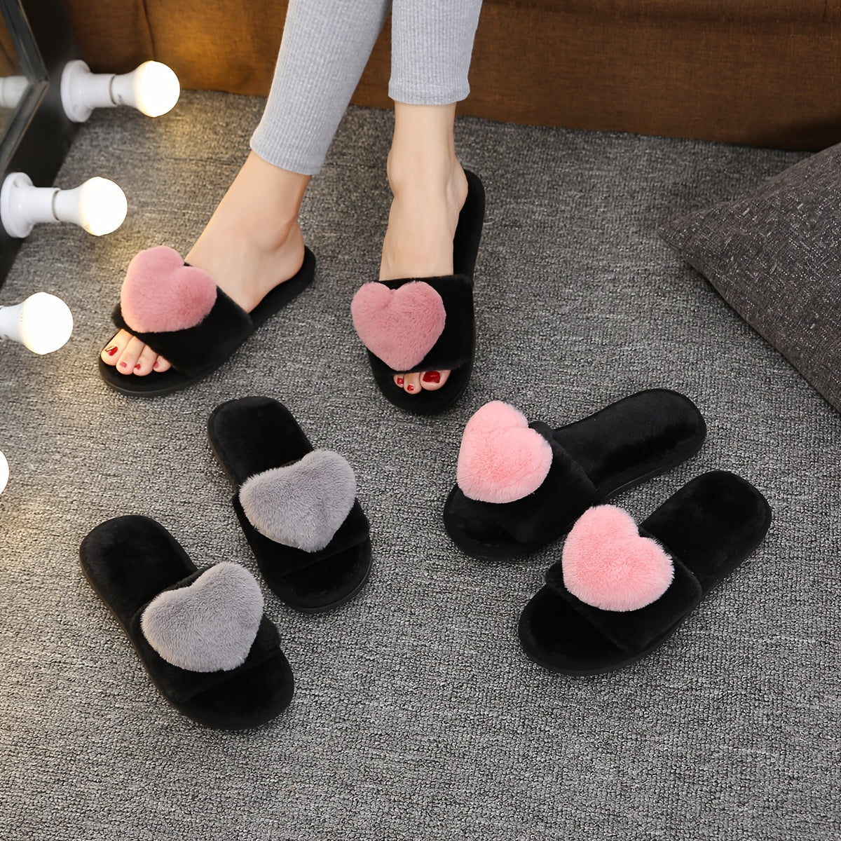 Warm and cozy women's plush slippers with heart accent for indoor comfort and style.