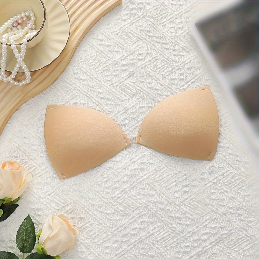 Invisible push-up bra with front buckle, silicone anti-slip stickers and transparent shoulder straps included.