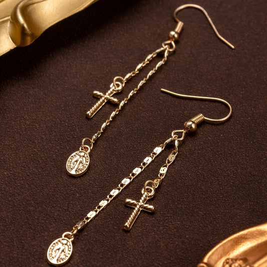 Vintage elegance meets modern style with these beautiful 14K gold plated Cross & Virgin Mary tassel earrings. Crafted from copper with iron posts, these non-feather earrings are perfect for daily wear or as a special gift. Suitable for Mardi Gras day and