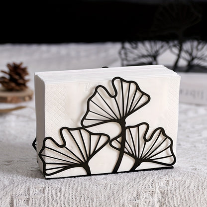 Stylish metal napkin holder with ginkgo leaf design, ideal for dining tables and kitchen decor in restaurants, hotels, and cafes.