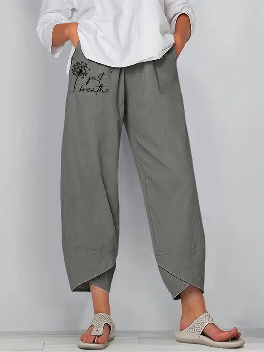 Baggy pants with dandelion print for plus size women, suitable for spring and fall.