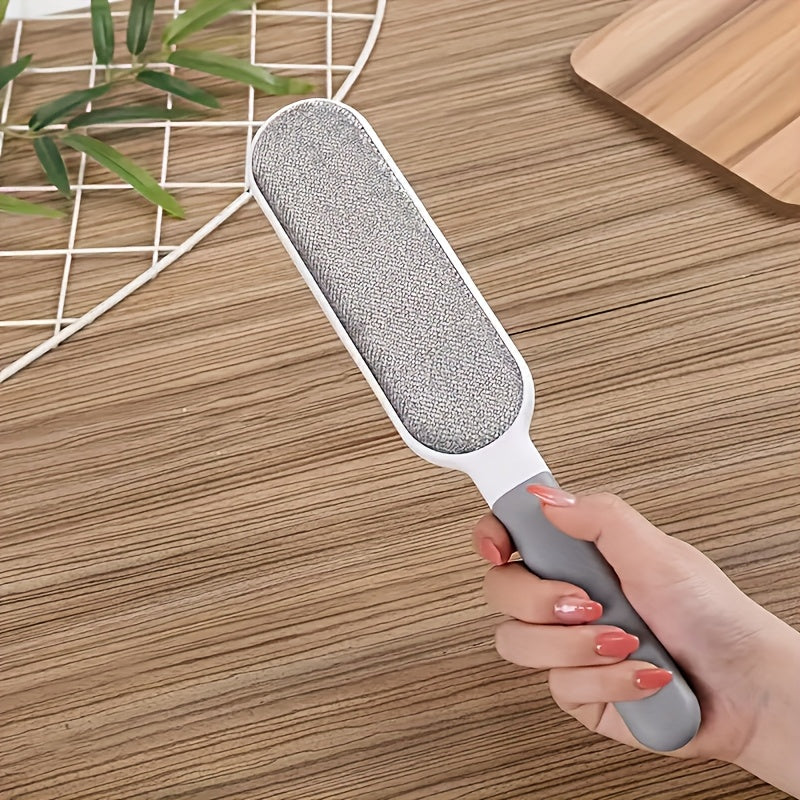 Get rid of pesky pet hair with the 1pc Electrostatic Pet Hair Remover. This double-sided manual dust brush is perfect for removing lint from clothes, sofa, furniture, bedding, and carpet. Made of plastic and requiring no electricity, this reusable