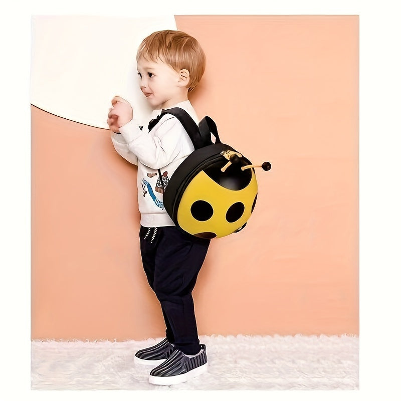 Durable, waterproof ladybug backpack for toddlers 1-3 years. Adjustable straps, stain-resistant, EVA material with yellow & black polka dot design. Perfect for boys & girls.