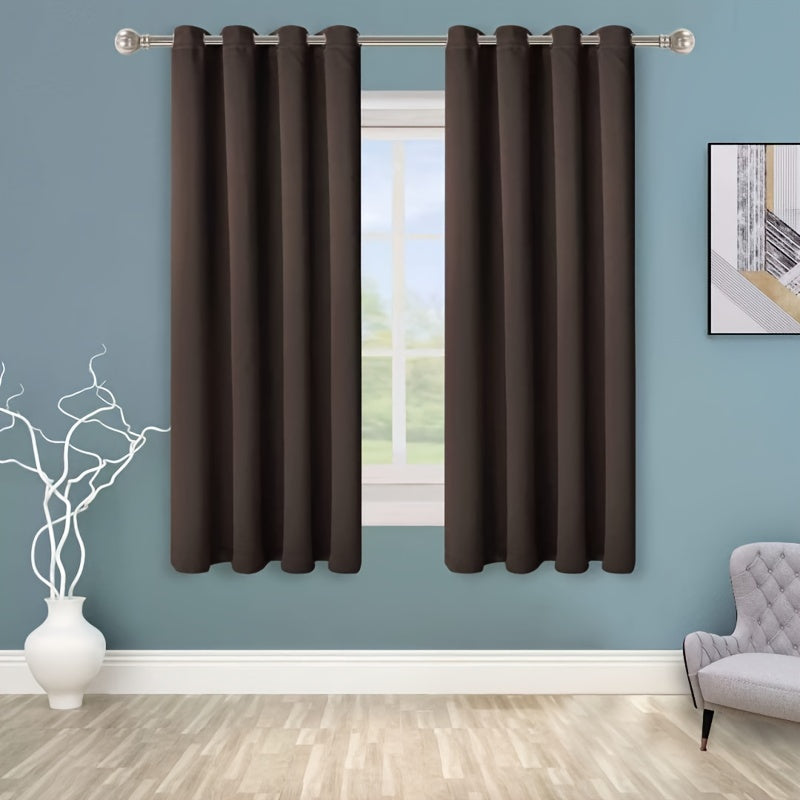 Enhance your space with this 1-panel blackout curtain in solid black color, designed to insulate against heat and cold, darken the room, and reduce incoming light. Perfect for adding style and functionality to your study, bedroom, kitchen, or living room