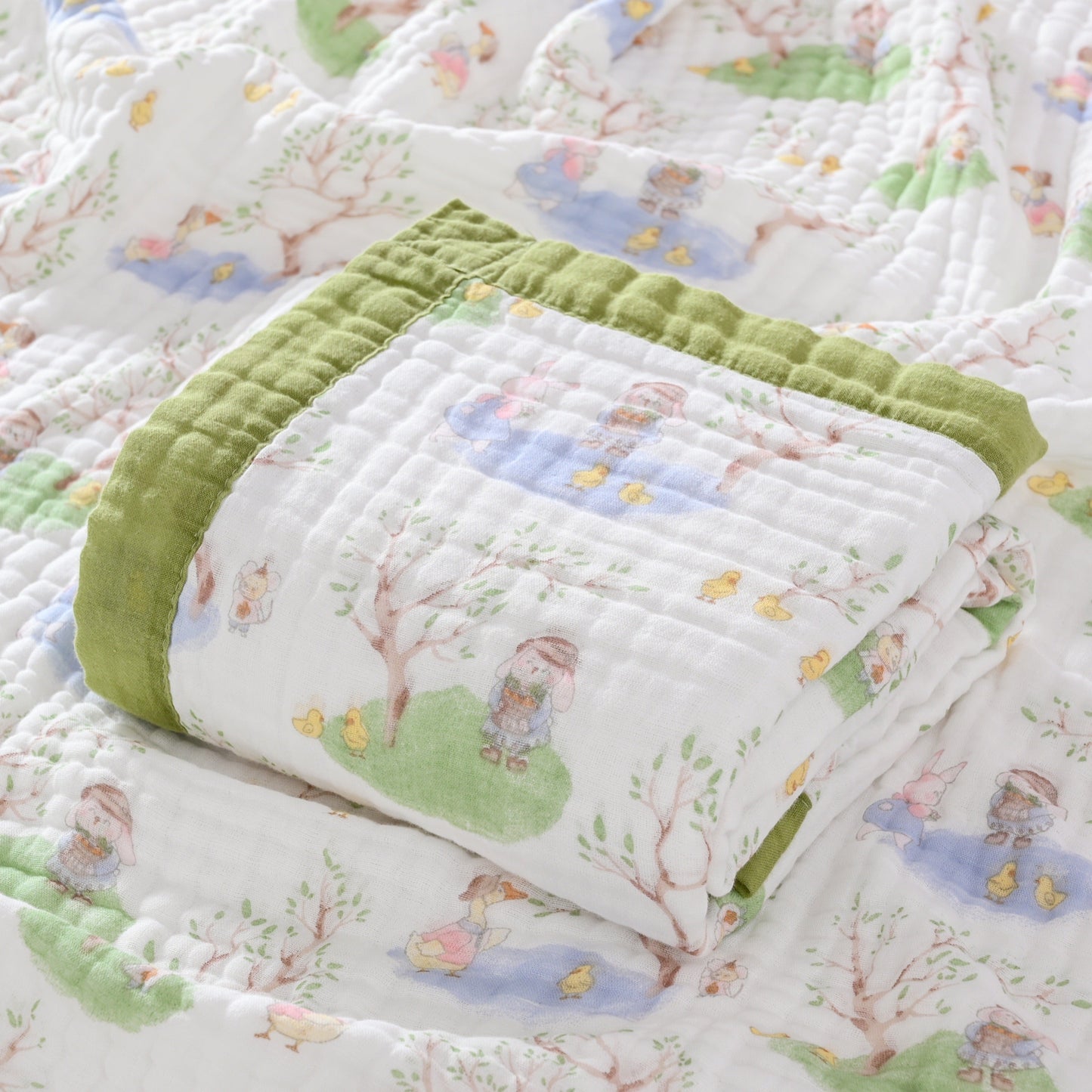 This multipurpose contemporary throw blanket is made of 6 layers of thick cotton gauze with a cute cartoon pattern. It is hypoallergenic and stain-resistant, making it perfect for use in the bath, for napping, on the bed, or in the office. Please hand