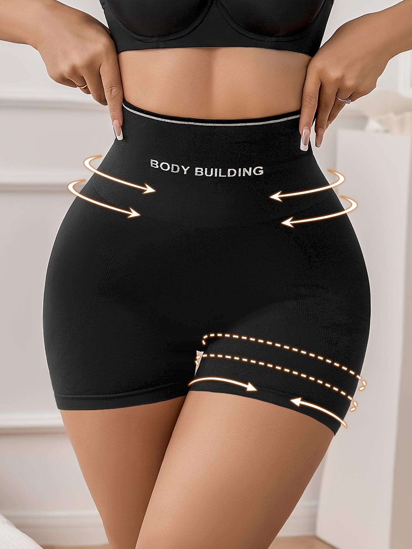 Women's High-Waist Thigh Slimmer in Solid Color, Seamless Contouring Shorts made of Polyamide and Elastane Knit Fabric with Hollow Back Detail.