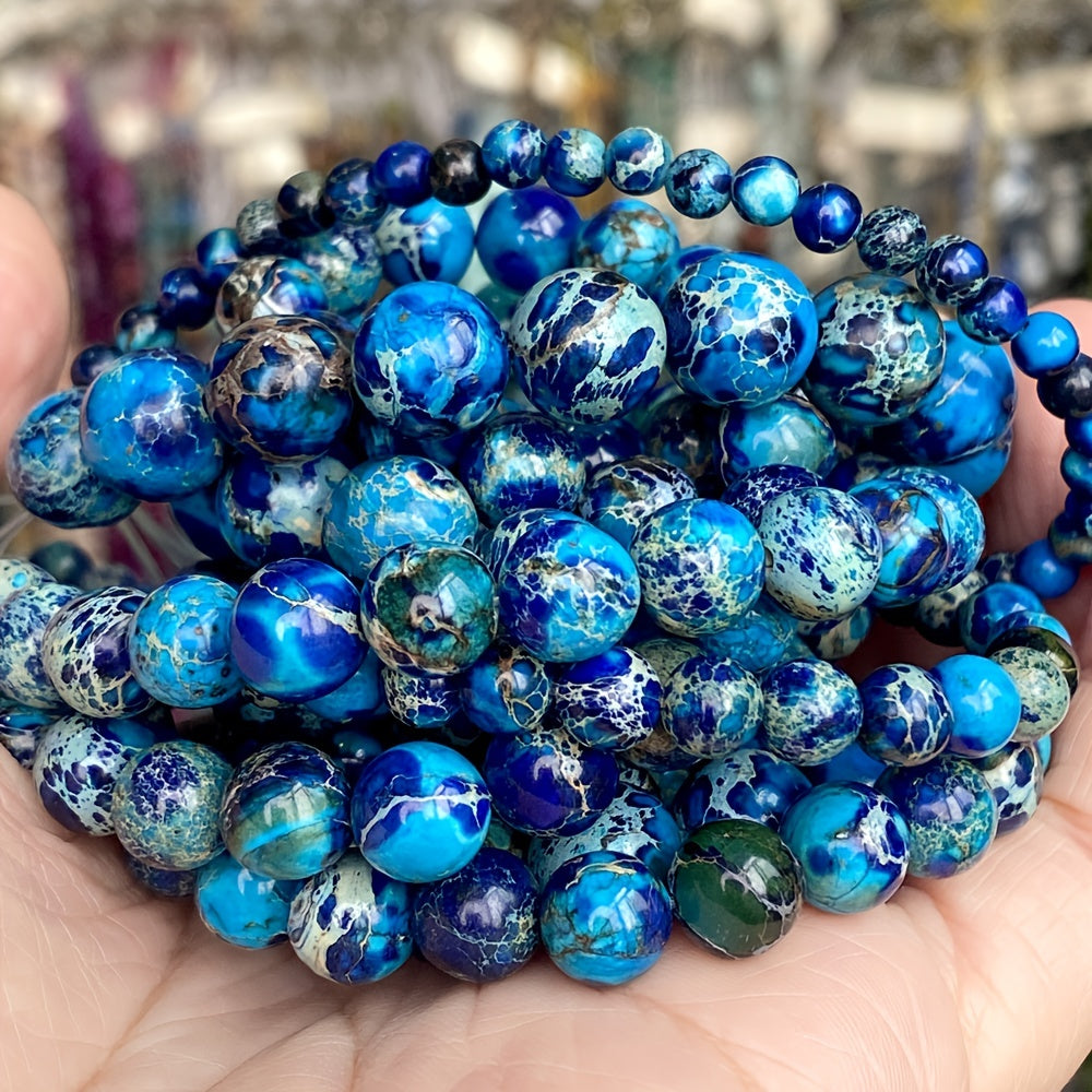 TeoWaki offers a variety of natural and colorful sea sediment turquoise stone beads in sizes 4mm, 6mm, 8mm, and 10mm. These round loose beads are perfect for creating your own jewelry pieces like necklaces, bracelets, and earrings. Add a touch of