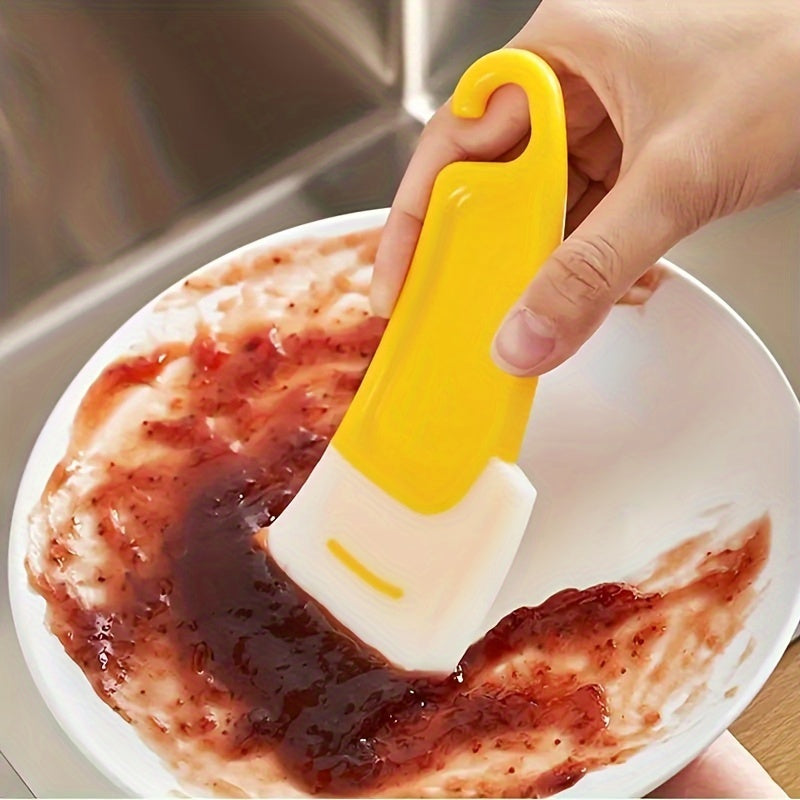 Versatile Silicone Kitchen Scraper with Multifunctional Wiper Blade - Easy Cleaning and Reusable. Features Medium Firmness and Plastic Handle for Use in Living Room, Bedroom, Bathroom, Toilet, and Kitchen. Non-Electric and Perfect for All Household