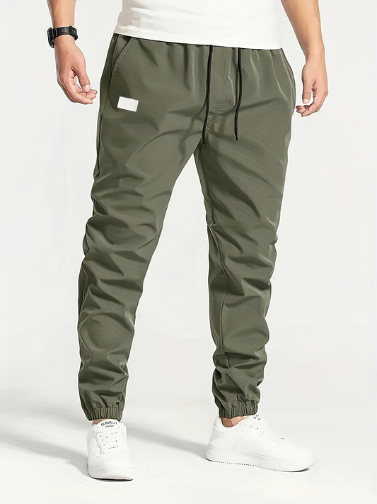 Men's Beige Cargo Pants with Multiple Pockets - Machine washable, comfortable loose fit, ideal for outdoor activities, made of durable polyester fabric.