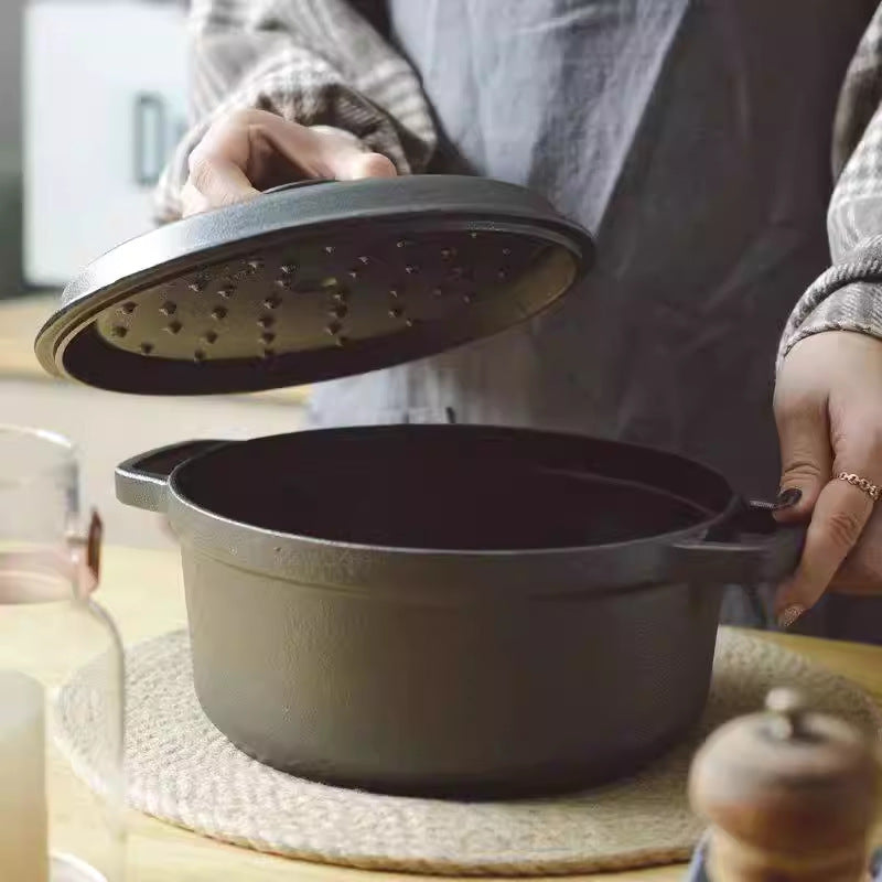 ITECHJOY's Traditional Cast Iron Stew & Soup Pot with Lid is a durable and uncoated kitchen essential for home cooking. Perfect for making stews and soups, this pot is a must-have addition to your kitchenware collection.