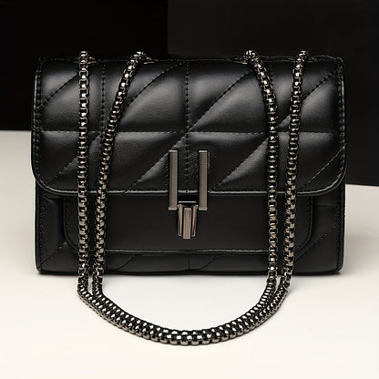 Stylish black quilted crossbody bag with adjustable strap, waterproof faux leather and embroidered detail. Perfect for women's fashion with a classic look and matching chain.