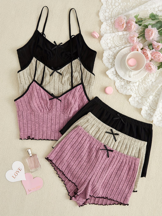 Women's 3-piece sleepwear set featuring pajamas, shorts, and tank top in soft, skin-friendly fabric for cozy home lounging.