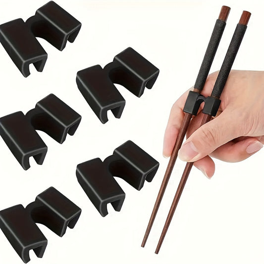 Set of 5 reusable plastic training chopstick hinges for adults, beginners, trainers, and learners with easy-to-use rests & holders.