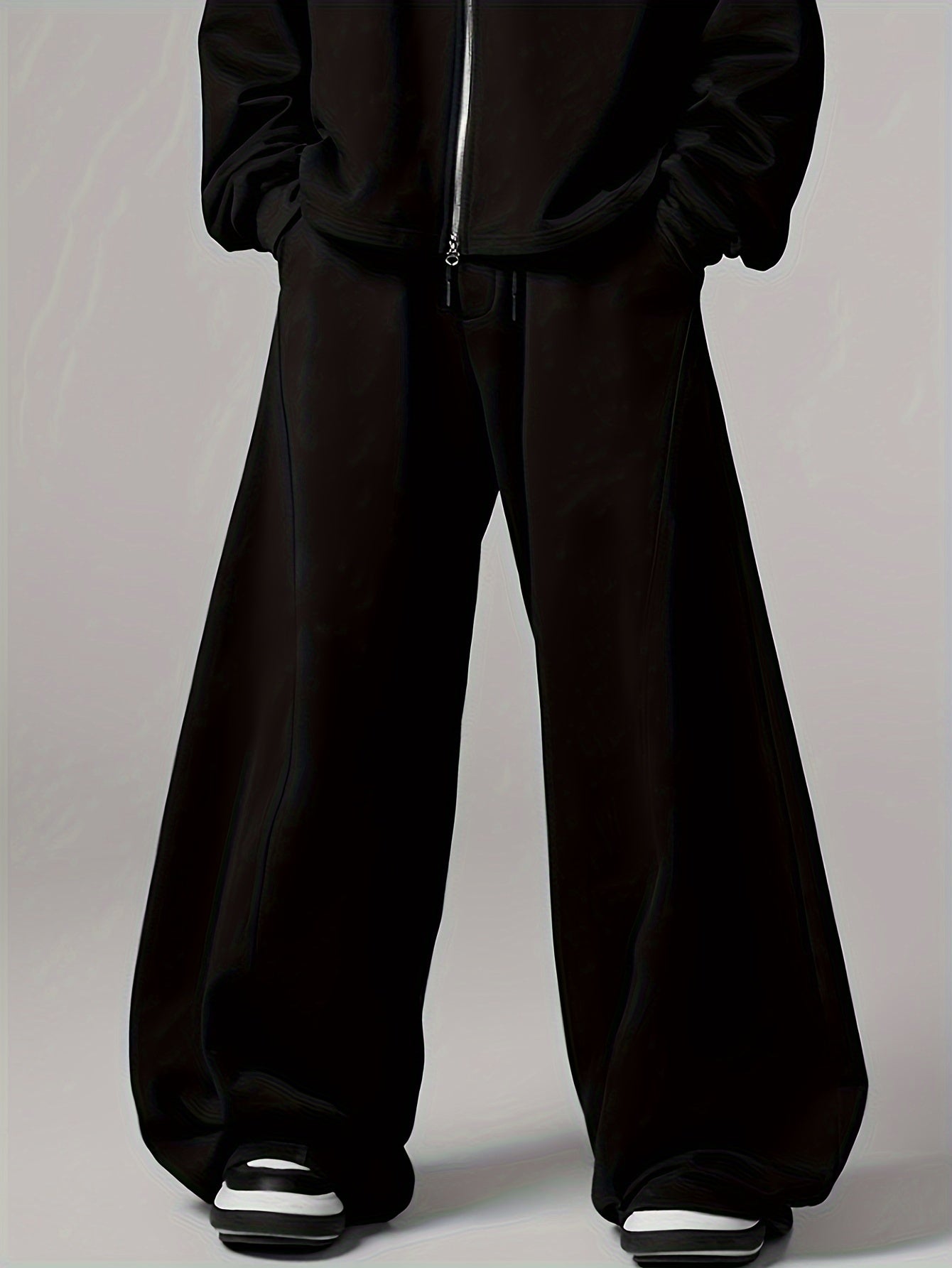 Loose fit wide leg sweatpants for men, ideal for casual sportswear.