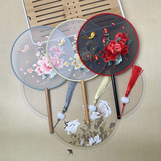 Beautifully crafted Chinese style silk embroidered fan with decorative tassel flower, perfect for use at home, while traveling, in school, or in the office.