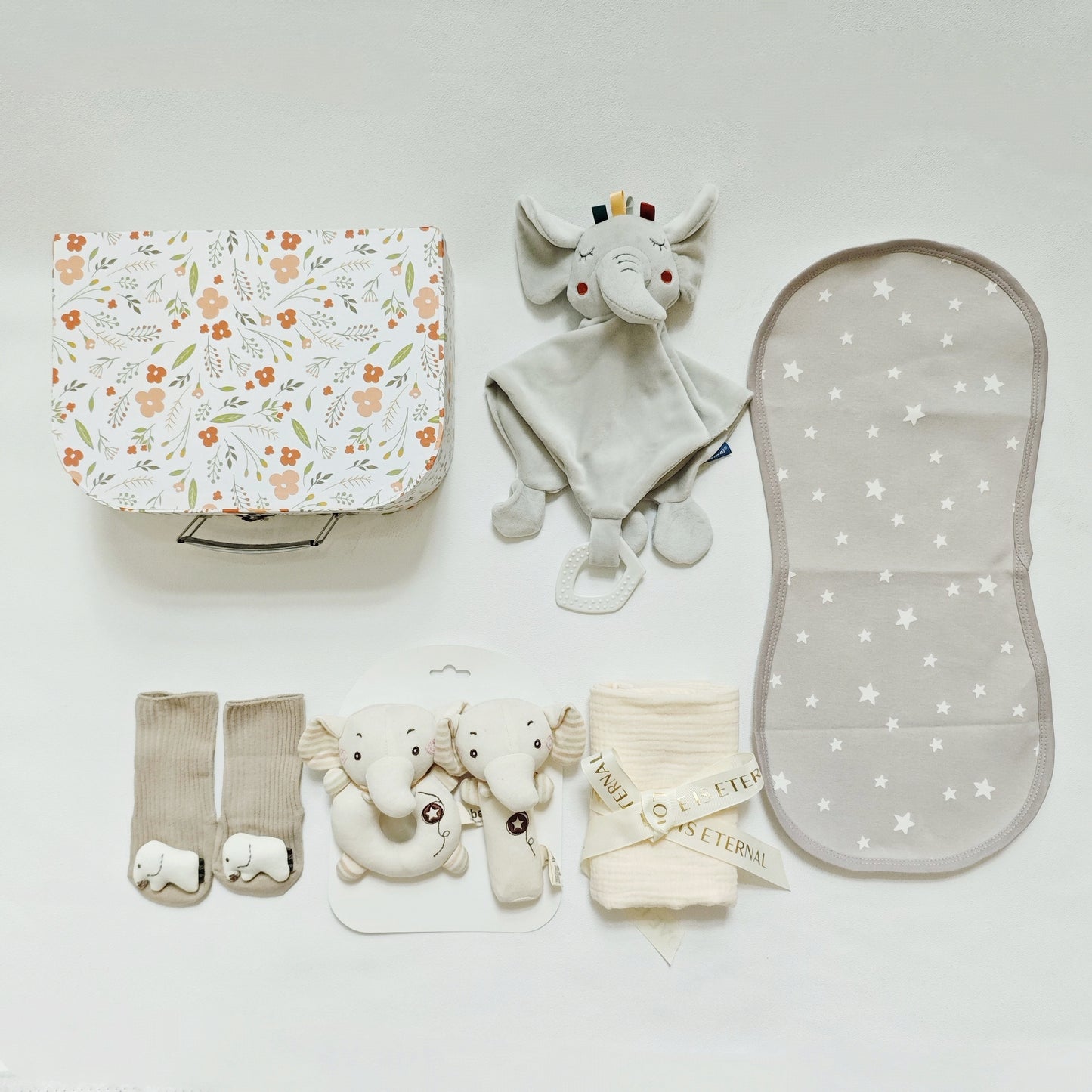 Set of 5 Baby Shower Gifts for Boys and Girls, including a baby gift basket with essentials like a blanket, lovey, socks, and more. Ideal for newborns.